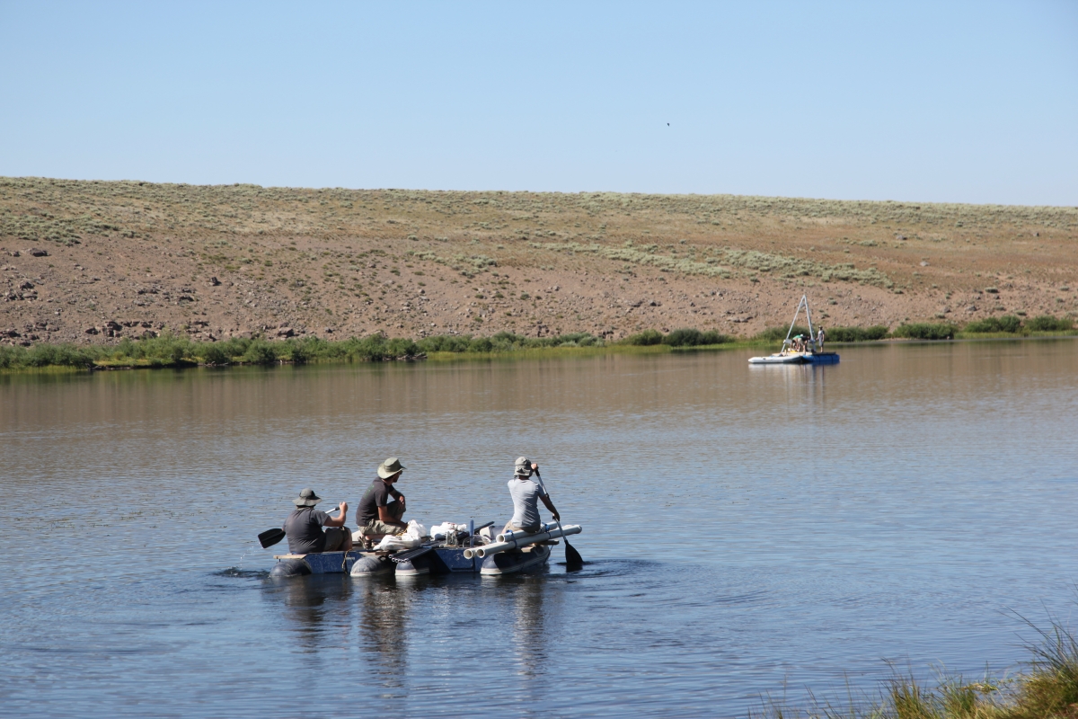 Members of Abbott’s team head out onto Fish Lake in Utah in order to take sediment cores of the lake bottom for the recently published drought history study.