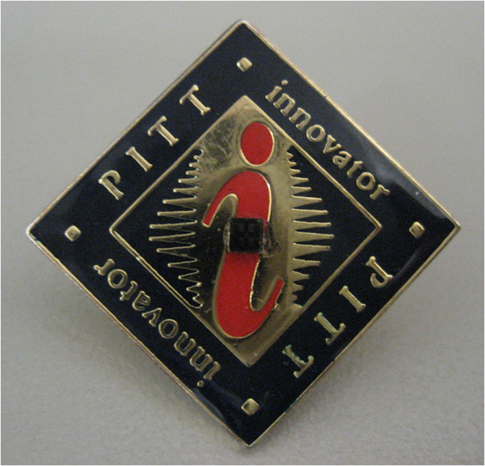 The pH-sensing chip sits in the middle of this Pitt Innovator lapel pin.